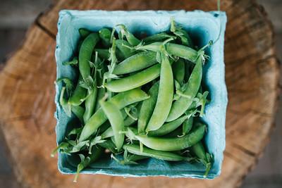 Sugar snap peas in a carton